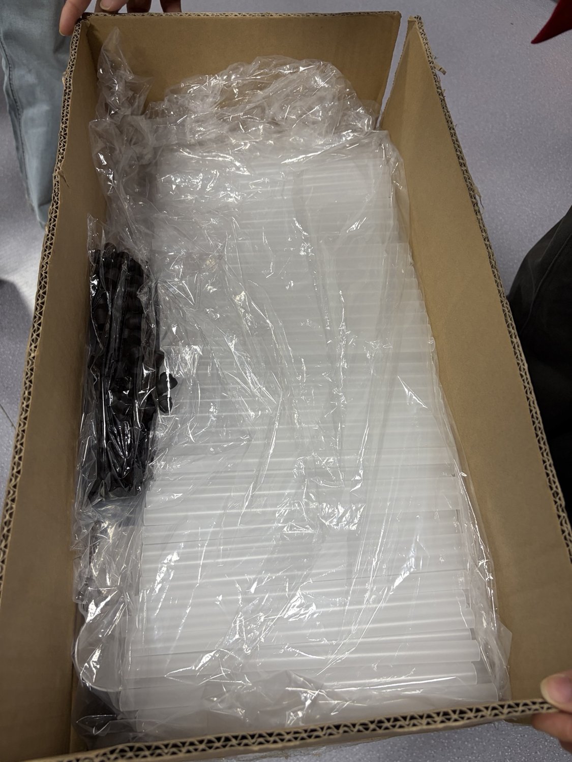 Custom Sushi Push Pop Tube Lids: Our Own Mold and Packaging Development 4 Long translucent sauce tubes and black accessories packed separately in a carton